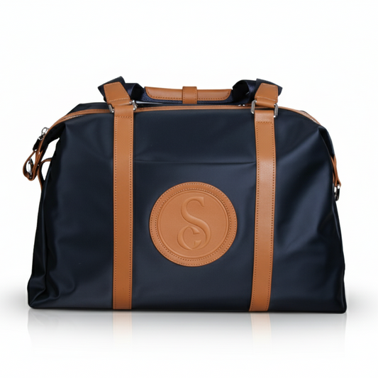 Дорожная и спортивная сумка с деталями из натуральной кожи